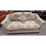 OVERSTUFFED 2 SEATER SETTEE WITH BEIGE FLORAL PATTERN