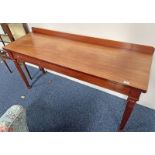 19TH CENTURY MAHOGANY SIDE TABLE ON REEDED SUPPORTS.