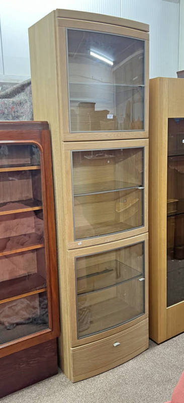 OAK DISPLAY CABINET WITH 3 GLAZED PANEL DOORS OPENING TO GLASS SHELVED INTERIOR OVER SINGLE DRAWER.