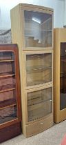 OAK DISPLAY CABINET WITH 3 GLAZED PANEL DOORS OPENING TO GLASS SHELVED INTERIOR OVER SINGLE DRAWER.