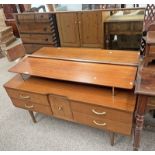 TEAK DRESSING TABLE WITH MIRROR OVER CENTRALLY SET SINGLE SHORT DRAWERS FLANKED ON EACH SIDE BY 2