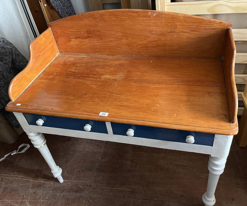 PINE WASH STAND WITH 3/4 GALLERY TOP OVER 2 DRAWERS ON TURNED SUPPORTS.