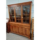 REPODUX YEW BOOKCASE WITH 3 ASTRAGAL GLASS PANEL DOORS OVER 3 DRAWERS OVER 3 PANEL DOORS ON BRACKET