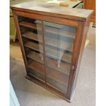 MAHOGANY BOOKCASE WITH SINGLE GLAZED PANEL DOOR OPENING TO SHELVED INTERIOR,