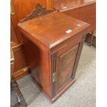 LATE 19TH CENTURY MAHOGANY & WALNUT SINGLE DOOR BEDSIDE CABINET ON PLINTH BASE