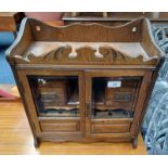 LATE 19TH CENTURY OAK SMOKER'S CABINET WITH 2 GLAZED PANEL DOORS OPENING TO FITTED INTERIOR WITH 4