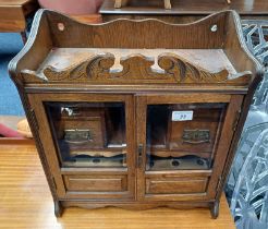 LATE 19TH CENTURY OAK SMOKER'S CABINET WITH 2 GLAZED PANEL DOORS OPENING TO FITTED INTERIOR WITH 4