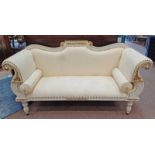 WHITE & GILT SCROLL ARM SETTEE WITH SHAPED BACK ON DECORATIVE REEDED SUPPORTS Condition