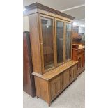 20TH CENTURY OAK BOOKCASE WITH 3 GLAZED PANEL DOORS OPENING TO SHELVED INTERIOR OVER BASE WITH 3