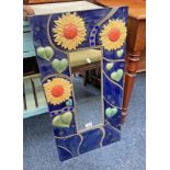 RECTANGULAR MIRROR WITH PAINTED TILE INSET FRAME DECORATED WITH SUNFLOWERS SIGNED 'MA',