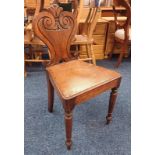 19TH CENTURY OAK HALL CHAIR WITH DECORATIVE CARVED BACK ON TURNED SUPPORTS