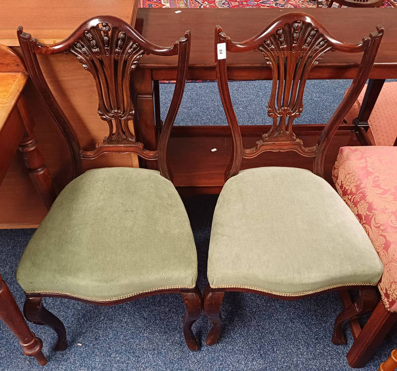 PAIR OF 20TH CENTURY MAHOGANY HAND CHAIRS WITH FRETWORK BACKS ON SHAPED SUPPORTS