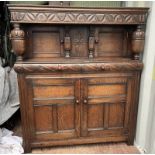 19TH CENTURY STYLE CARVED OAK COURT CUPBOARD WITH 2 SMALL PANEL DOORS OVER 2 DRAWERS & 2 PANEL