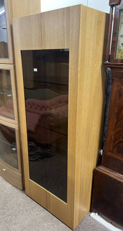 OAK DISPLAY CABINET WITH 2 GLAZED PANEL DOORS OPENING TO SHELVED INTERIOR.