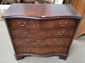 19TH CENTURY CROSSBANDED MAHOGANY CHEST OF DRAWERS WITH SERPENTINE FRONT & 4 GRADUATED DRAWERS ON