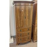 EARLY 20TH CENTURY INLAID MAHOGANY BOW FRONT WARDROBE WITH 2 PANEL DOORS OVER 3 DRAWERS ON BRACKET