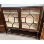 EARLY 20TH CENTURY MAHOGANY BOOKCASE WITH 2 ASTRAGAL GLASS PANEL DOORS - 139 CM TALL X 151 CM LONG