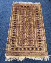 GOLD GROUND MIDDLE EASTERN RUG 155 X 96 CM