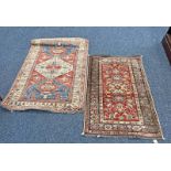 TWO MIDDLE EASTERN RUGS 118 X 80 CM AND 140 X 97 CM Condition Report: lot weighs