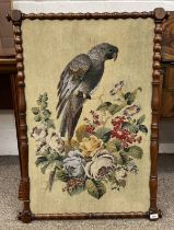 19TH CENTURY MAHOGANY FRAMED GLASS BEAD TAPESTRY OF A PARROT & FLOWERS,