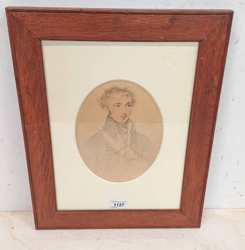 EARLY 19TH CENTURY PENCIL AND WATERCOLOUR PORTRAIT OF A YOUNG NAVAL OFFICER.