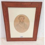 EARLY 19TH CENTURY PENCIL AND WATERCOLOUR PORTRAIT OF A YOUNG NAVAL OFFICER.