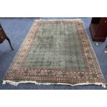 GREEN GROUND MIDDLE EASTERN CARPET 265 X 192 CM