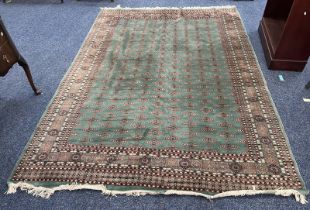 GREEN GROUND MIDDLE EASTERN CARPET 265 X 192 CM