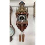 ORNATE BRASS CHIMING WALL CLOCK WITH WOODEN CASE & TITAN ATLAS FIGURE,