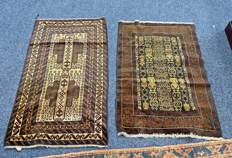 TWO MIDDLE EASTERN RUGS 130 X 87 CM AND 130 X 83 CM