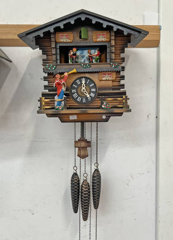 SWISS CHALET STYLE BUGLER CUCKOO CLOCK WITH DANCERS Condition Report: Sold as seen