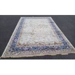 IVORY GROUND FULL PILE KASHMIR CARPET WITH AN ALL OVER TREE OF LIFE DESIGN.