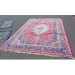 RED GROUND FULL PILE KASHMIR CARPET WITH TRADITIONAL FLORAL MEDALLION DESIGN 385 X 270CM