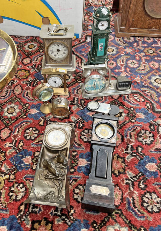 SELECTION OF SMALL CLOCKS INCLUDING A GILT SWIZA BEDSIDE CLOCK, SILVER MOUNTED MINIATURE CLOCK ETC.