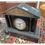 LATE 19TH OR EARLY 20TH CENTURY BLACK HARDSTONE MANTLE CLOCK WITH CORINTHIAN COLUMNS