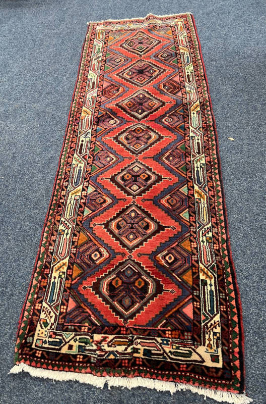 TERRACOTTA GROUND PERSIAN SUROK RUNNER WITH DIAMOND MEDALLION DESIGN - 252 X 87 CM