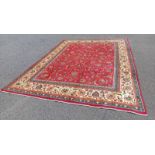 RICH RED GROUND HAND WOVEN IRANIAN CARPET WITH ALL OVER FLORAL PATTERN 375 X 300CM