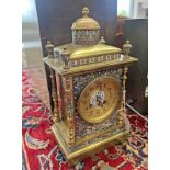 GILT BRASS & CHAMPLEVE ENAMEL MANTLE CLOCK WITH DECORATIVE COLUMNS & DOMED TOP,