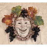 LARGE POTTERY MASK WITH FRUIT & LEAF SURROUND,