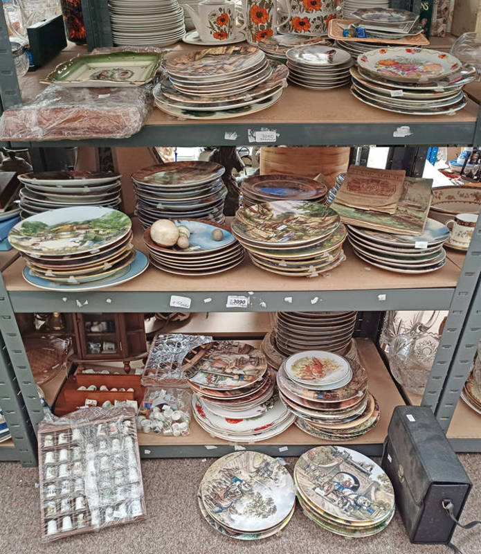 LARGE SELECTION OF WALL PLATES, 2 STAMP ALBUMS, LARGE SELECTION OF PORCELAIN THIMBLES IN RACKS,