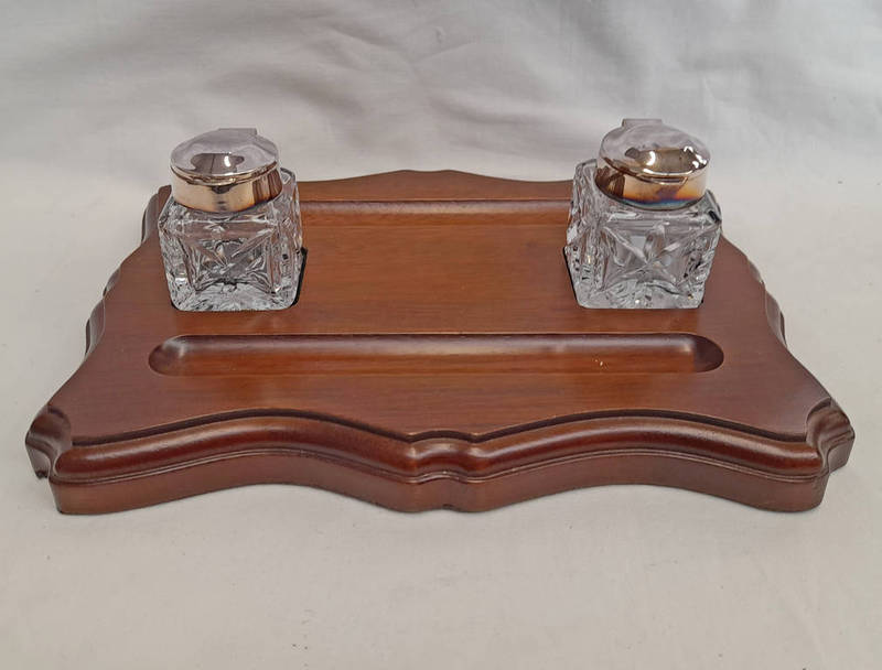 MODERN SILVER MOUNTED FACETED GLASS INKWELLS ON A FITTED WOODEN DESK STAND