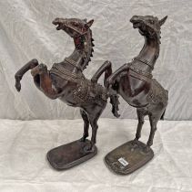 PAIR OF BENIN STYLE METAL REARING HORSES,
