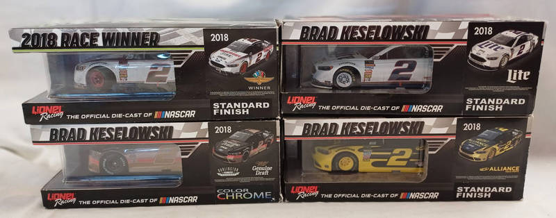 4 LIONEL RACING 1:24 SCALE NASCAR RELATED RACING CARS.