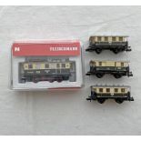 FLEISCHMANN 730501 CLASS ET99 02 0-6-0 DRB TOGETHER WITH THREE CARRIAGES