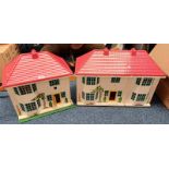 TWO DOLLS HOUSES TOGETHER WITH VARIOUS ACCESSORIES AND OTHER DOLLS.