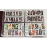 2 ALBUMS OF CIGARETTE CARDS TO INCLUDE OGDENS FOWLS PIGEONS & DOGS, CHURCHMAN HOWLERS,