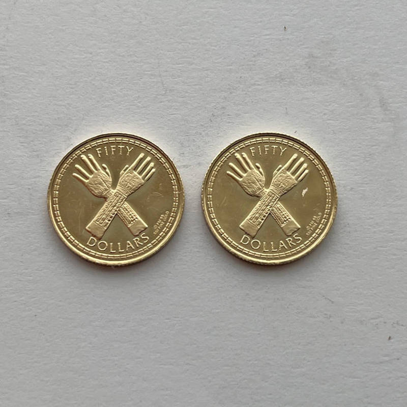 TWO 1988 BRITISH VIRGIN ISLANDS CHIMU KING'S CROSSED HANDS FIFTY DOLLARS COINS - TOTAL WEIGHT: 4.