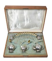 A Three-Piece Russian Silver Tea-Service and Associated Tea-Equipage, The Tea-Service Probably by F
