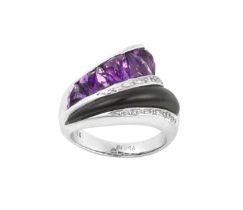 An Amethyst, Onyx and Diamond Ring, by Bellarri the abstract form comprising of six fancy cut