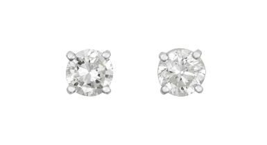 A Pair of 18 Carat White Gold Diamond Solitaire Earrings the round brilliant cut diamonds in four